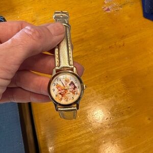 Disney Princesses Watch. Gold/gold band. Like new, new battery, runs great